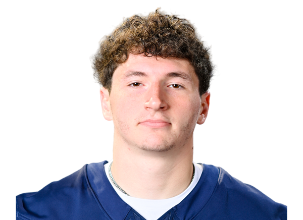 Sam Brecker headshot
